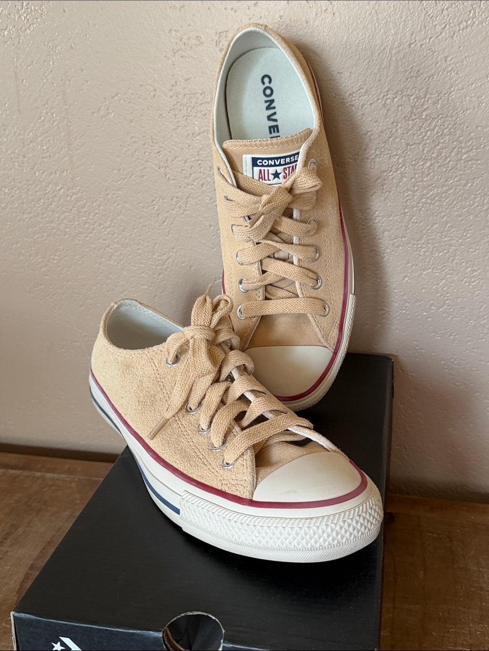 Converse Chuck Taylor All Star Ox sneakers in a beige or "Coastal Dune" suede